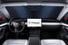 Windshield sunshade installed car interior with a Magnelex logo on a screen