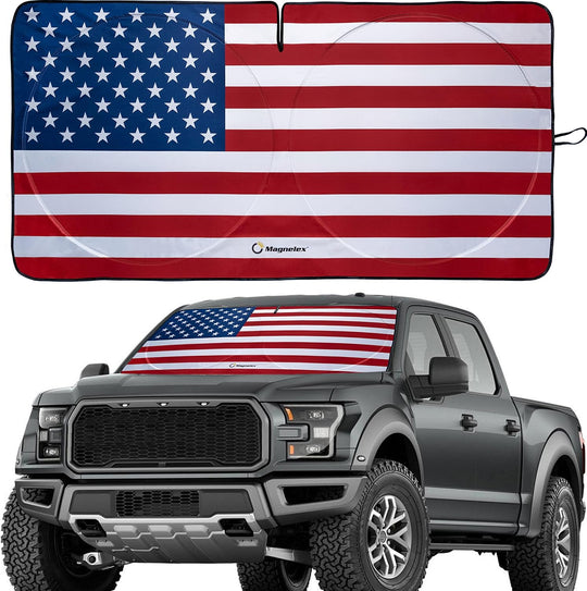 Patriotic American flag sunshade displayed on a Ford F-150 pickup truck.