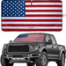Patriotic American flag sunshade displayed on a Ford F-150 pickup truck.