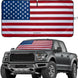 Patriotic American flag sunshade displayed on a Ford F-150 pickup truck.