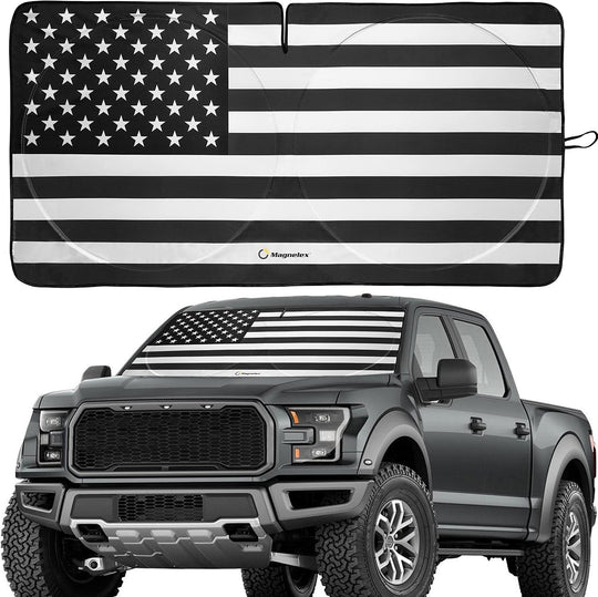 Patriotic black & white American flag sunshade displayed on a Ford F-150 windshield.
