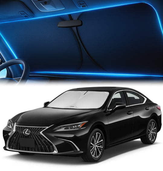 Custom-fit windshield sunshade installed inside a Lexus ES sedan, showing full windshield coverage with a centered rearview mirror cutout.